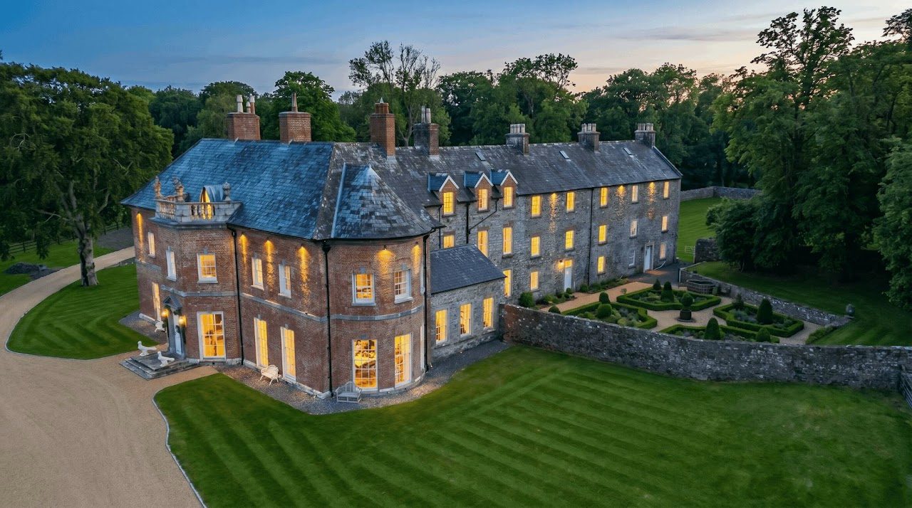 Newhall House and walled garden at twilight